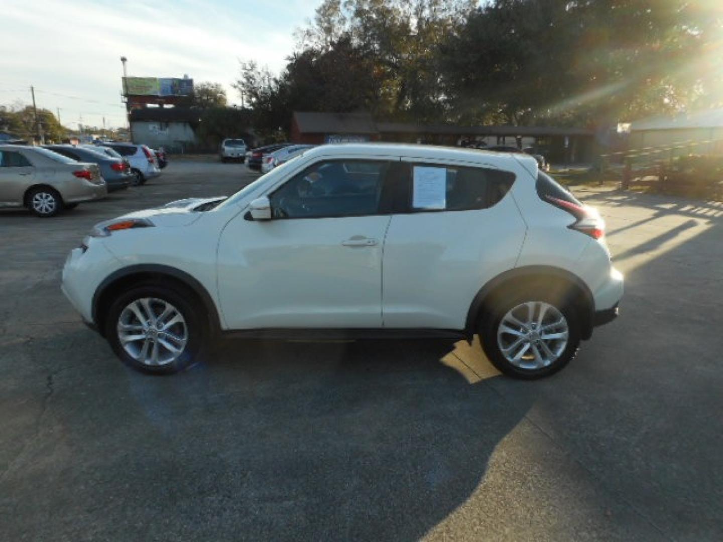 2016 WHITE NISSAN JUKE S; SL; SV; NISM (JN8AF5MR5GT) , located at 10405 Abercorn Street, Savannah, GA, 31419, (912) 921-8965, 31.988262, -81.131760 - Photo#2